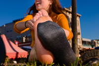 black socks to bare soles toe lint
